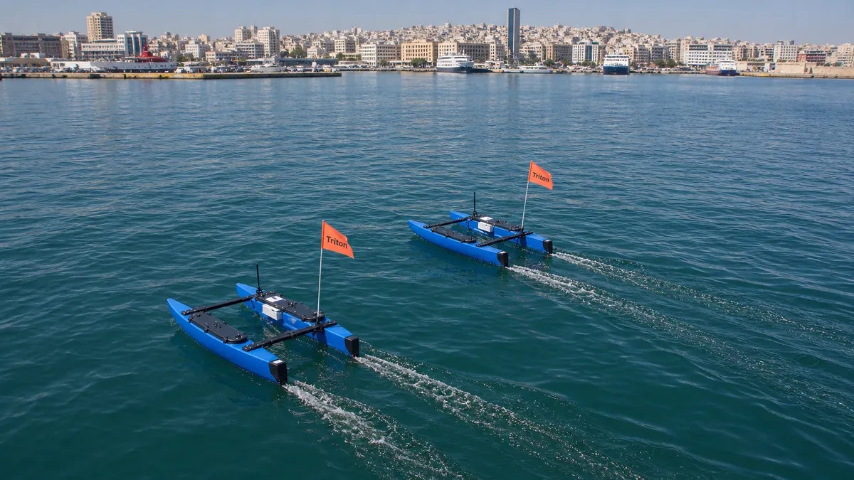 Two BlueBoat USVs underway in Piraeus harbour during on-water race day